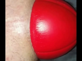 Huge 12 cm wide football in my stretched ass, watch it slide out up close.