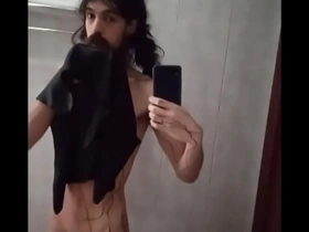 Very long bearded femenine boy teasing cock on mirror
