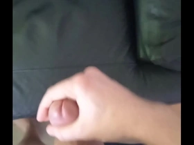Strong cumshot on couch