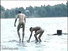 Steamy gay sex on the lake shore