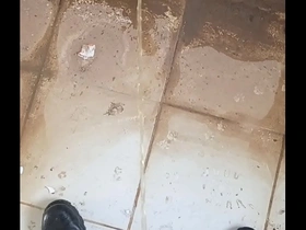 Pissing guy on a abandoned house